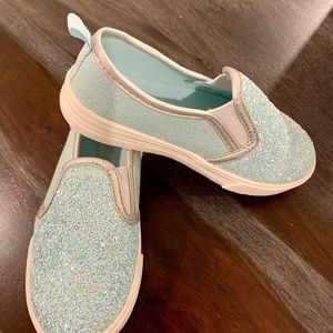 Frozen inspired slip on sneakers.